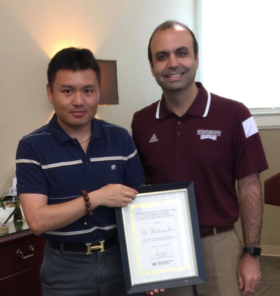Dr. Yucheng Liu (left) and Dr. Pedro Mago (ME Department Head, right)